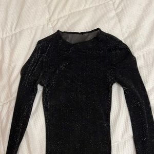 Sheer black top. Super cute with black tank underneath